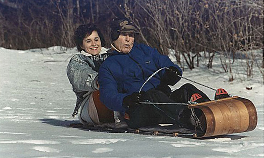 President Bush sledding at Camp David