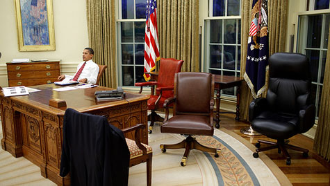 Obama on chair in Oval Office 