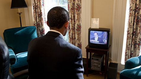 Obama watches press conference on TV