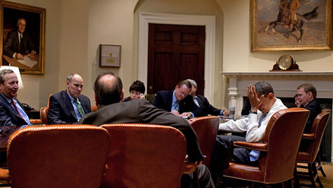 Obama staff meeting - hand on head 